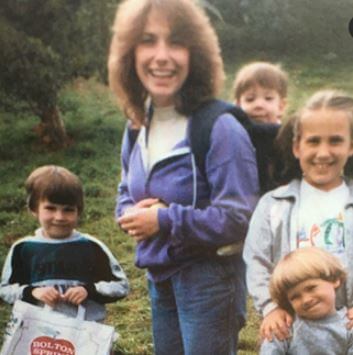 Young Carly Evans with her mother and siblings.